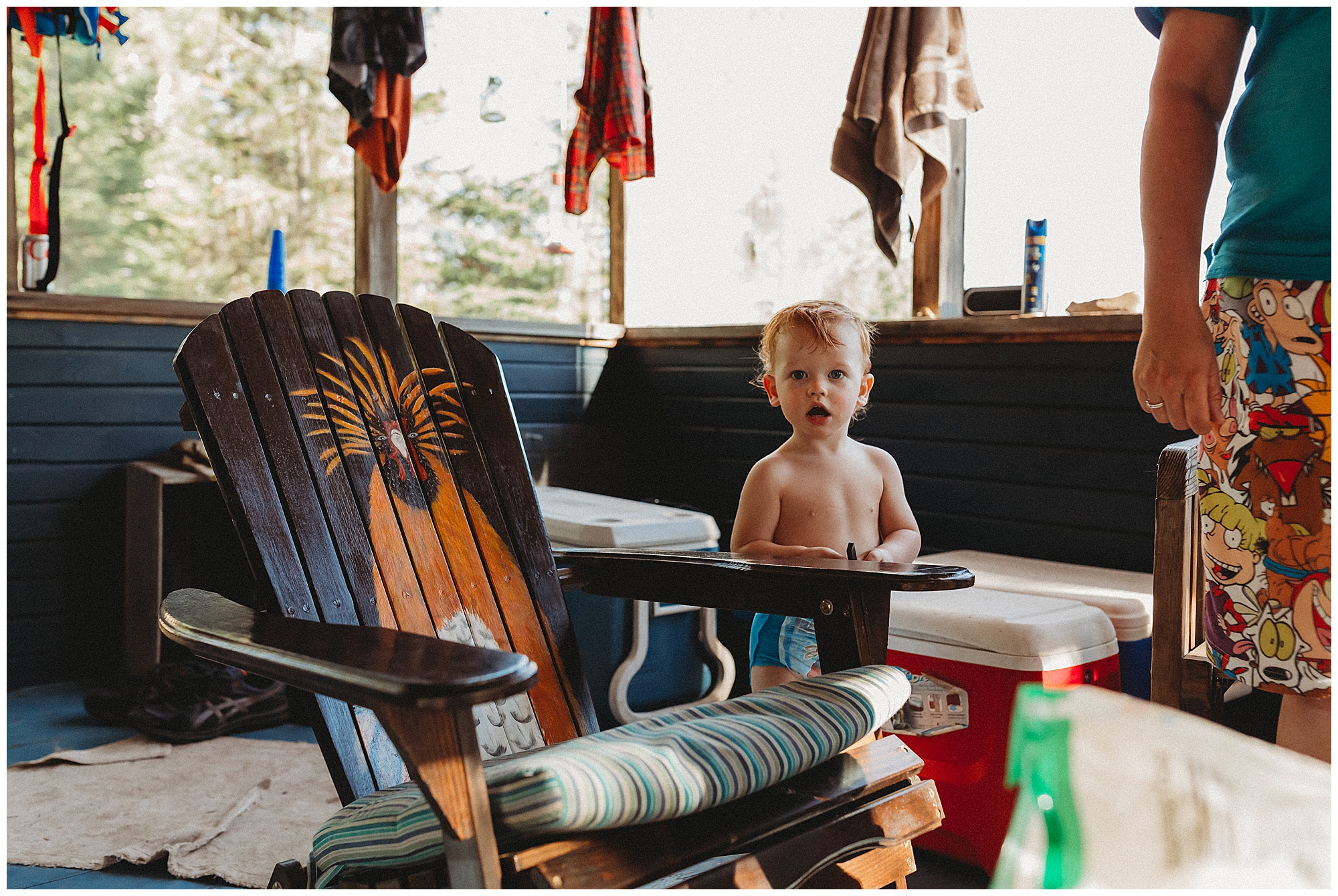 Photo of my nephew on the porch at the cabin in Northern Minnesota taken by Skyler Maire Photography.